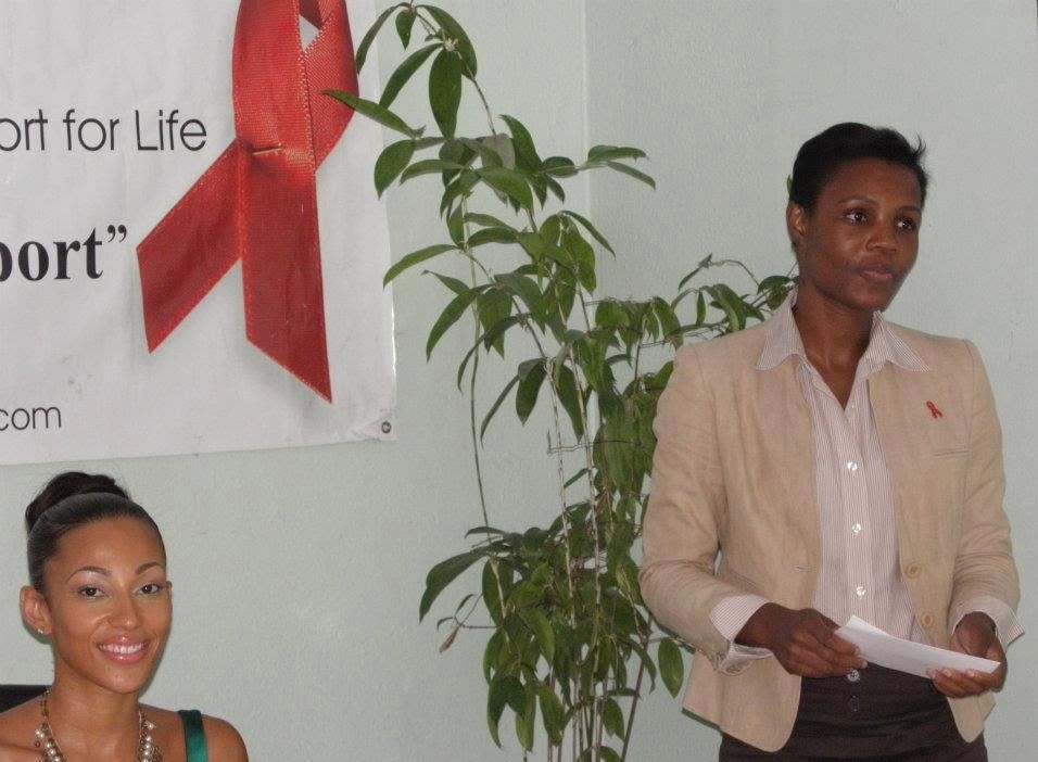 Kadine Reynolds serving as Business Development Manager, Jamaica AIDS Support for Life, with Miss Universe Jamaica Chantal Zaky