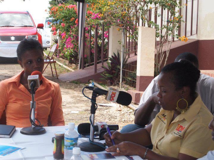Kadine Reynolds being interviewed by Radio Jamaica